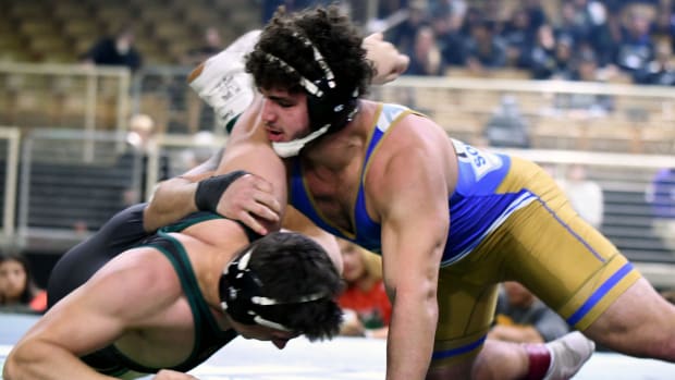 Miami South Dade junior Sawyer Bartelt roars to his third-straight championship during the 220-pound title match against Saint Vincent Saint Mary (Ohio) senior Bryson Getz at the 2023 Knockout Christmas Classic in December at Silver Spurs Arena in Kissimmee.